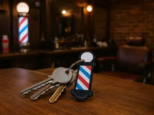 portachiavi a forma di palo da barbiere