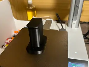 Wall coil holder