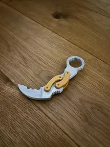 Kerambit knife fidget toy
