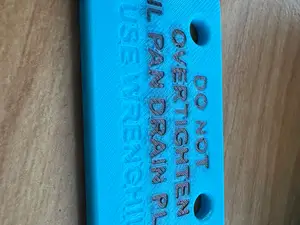 DO NOT OVERTIGHTEN OIL DRAIN PLUG SIGN