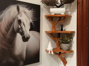 Estantería flotante con forma de rama de árbol