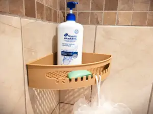 Shower corner shelf with hooks