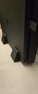 PS4 Slim vertical stand on table