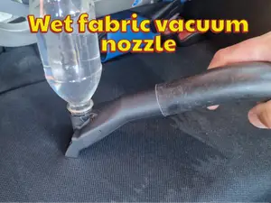 Wet fabric vacuum nozzle