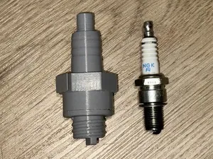 Spark plug case