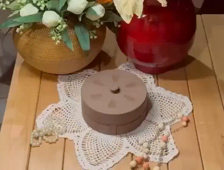 Rotating Jewelry Box with Automatic Drawer Opening