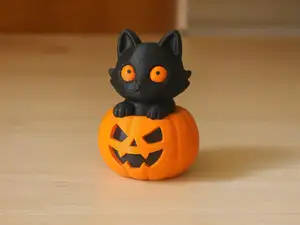 Halloween - Cute Cat in the Pumpkin