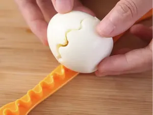 Cortador de huevos cocidos con forma de pajarito