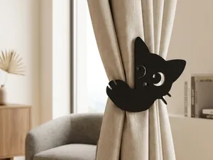Sujeta cortinas gato