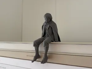 Frodo Sitting on Shelf Figure | LOTR Miniature