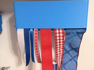 Wall Mounted Ribbon Organizer/Dispenser.