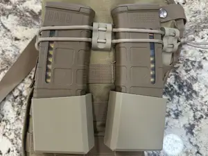Belt/Molle Clip Pmag pouch with detents.