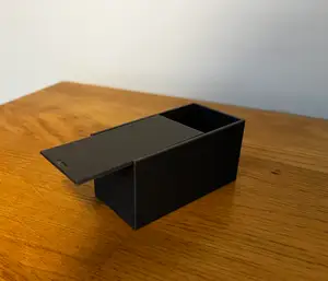 Small box with notched sliding lid