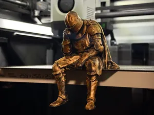 Sad Knight sitting on a ledge Figurine!
