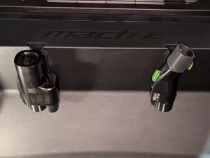 Holder for plug adapter for Mach E frunk