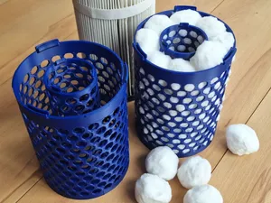 Pool filter housing for filter balls