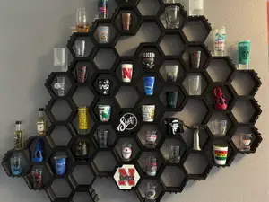 Wall mounted hexagon shelves / Shot glass display