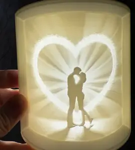 Man and Woman Kissing In front of Sparkling Heart