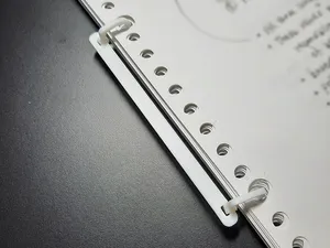 Thin-spine 2-ring binder for loose leaf paper