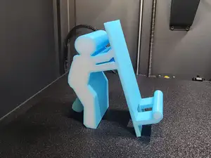 Human Figure Phone Stand