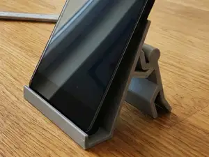 Stickman Phone Stand – Fun & Functional Design