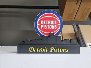 Detroit Pistons with skyline of Detroit NBA