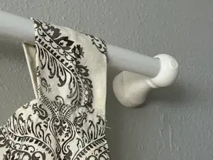 Curtain rod holder