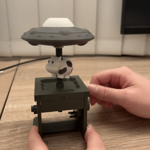 UFO Automata (Flying sauce abducting cow mechanical toy)