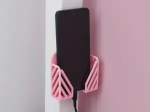 Wall mounted phone holder