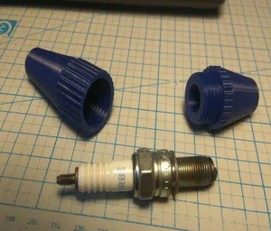 Spark plug case for NGK CR8E