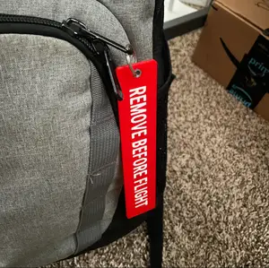 REMOVE BEFORE FLIGHT tag keychain replica
