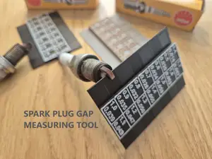 Spark plug gap measuring tool