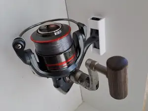 Fishing reel holder - wall mount