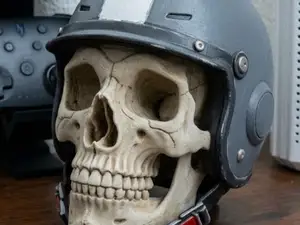 HUMAN SKULL WITH HELMET