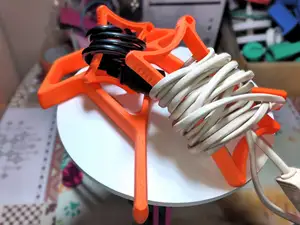 Organizadores/Enrolladores de Cables de Extensión