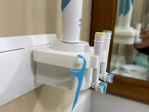 Oral B toothbrush head holder