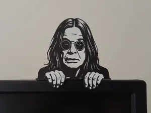 Ozzy Osbourne on monitor with stand