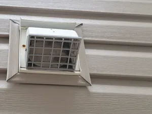 Outdoor vent cover with critter guard
