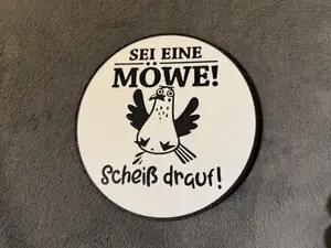 Schild, Sei eine Möwe scheiß drauf!