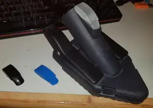 Replacement button for a vacuum cleaner.