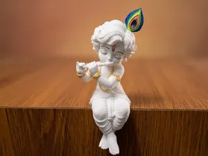 Edge-Sitting Baby Krishna Flute Figurine