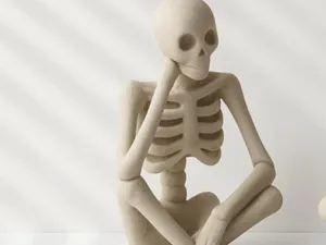 Sitting Skeleton Figurine – Halloween Decoration