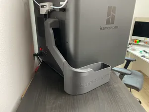 Side poop slide with bin