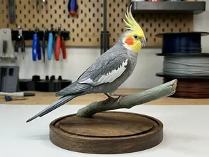 Calopsitta su ramo – Statuetta decorativa