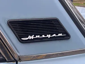 Emblem for the original VAZ-2106 plastic grille