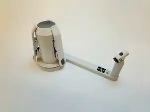 Wall mounted spool holder, clockwise rewind