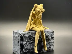 Sad Sailor Moon Anime Figurine sitting on a ledge!