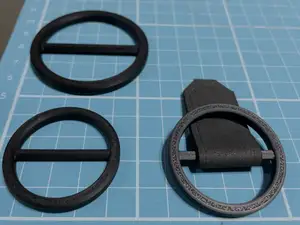 Round strap adjuster buckles