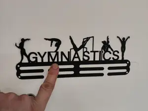 colgador medallas gimnasia artistica