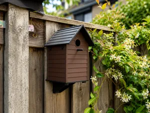 Classic birdhouse with mounting bracket.